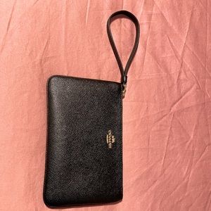 Coach black wristlet.